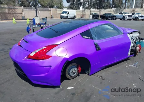 2014 Nissan 370Z Base (M6) z USA, uszkodzony, nr VIN JN1AZ4EH4EM633250